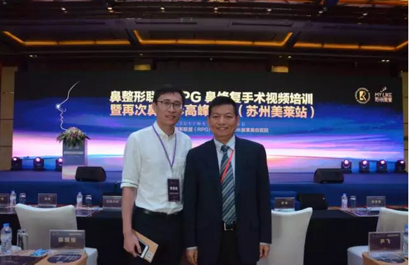 宁波美莱刘昆鹏主任(左)与 李圣利教授(右)合影留念